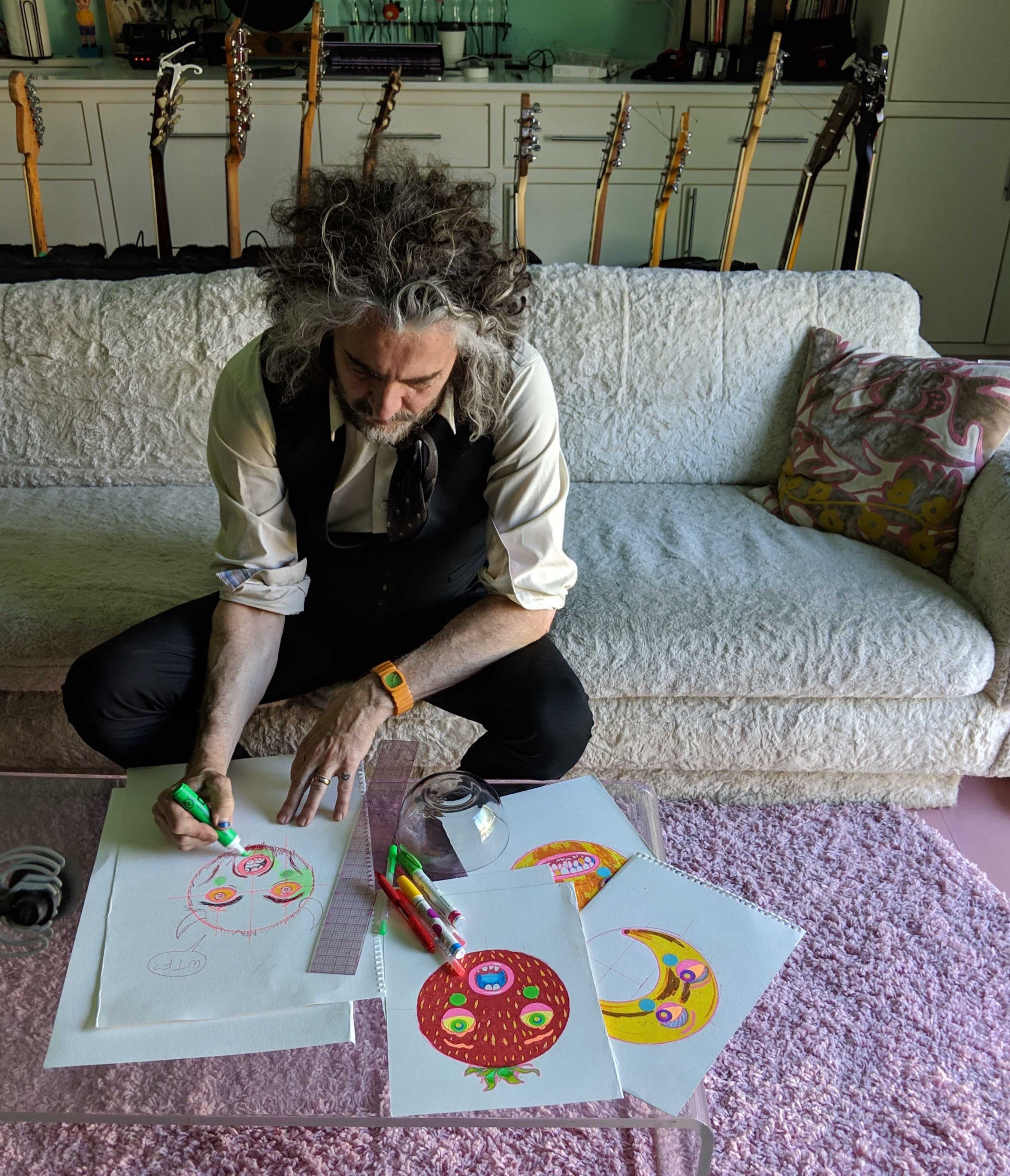 Wayne Coyne (The Flaming Lips) sketches designs for the inflatable fruit.