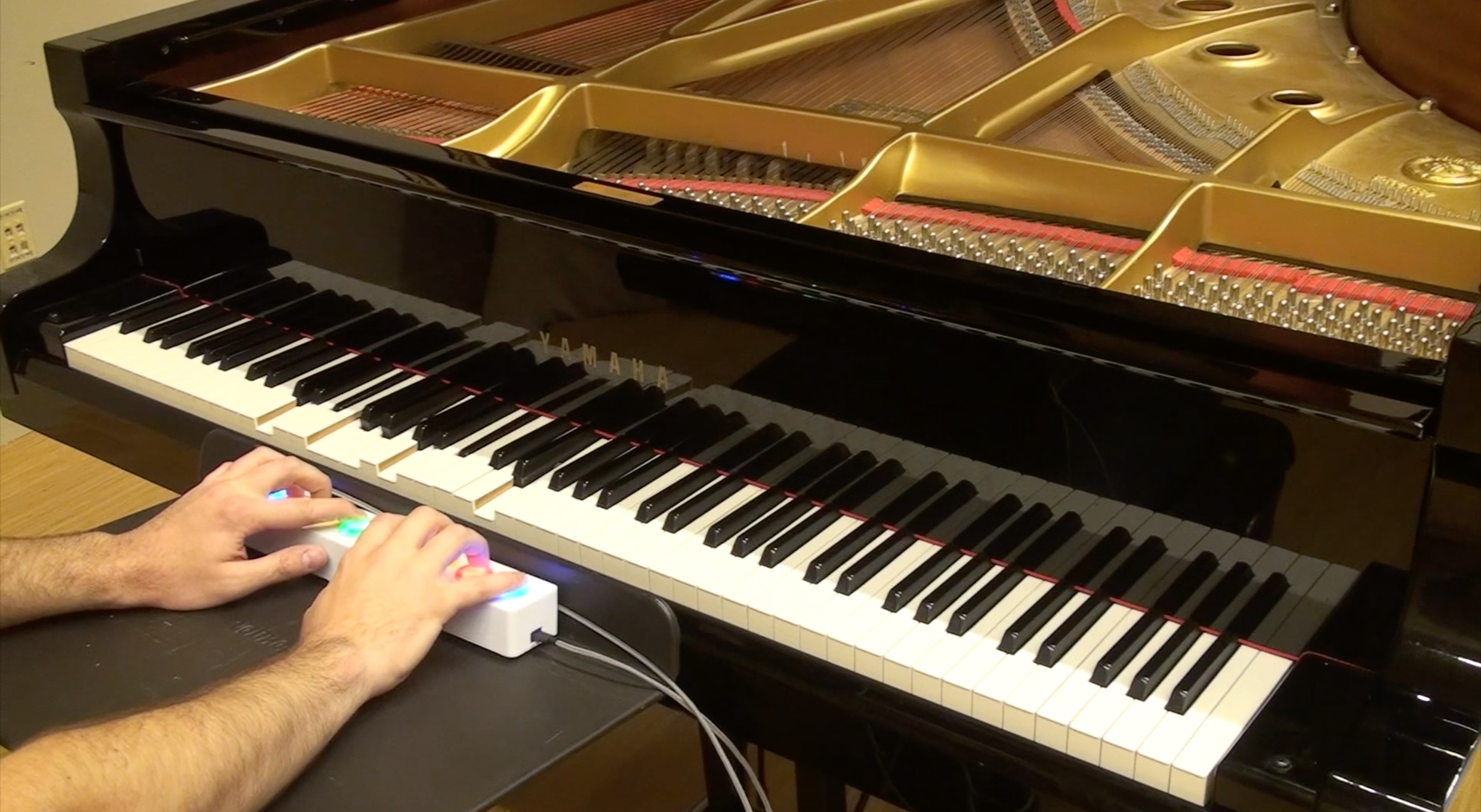 Piano Genie: An Intelligent Musical Interface